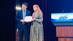 Prof Jinhua Cheng receiving a certificate of Appreciation and Friendship from Kate Robinson Prof Jinhua Cheng and Kate Robinson